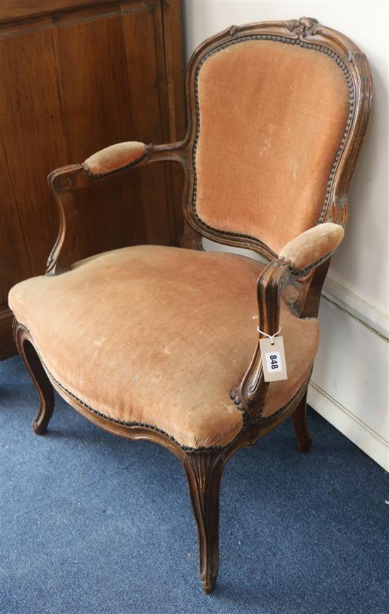 A pair of 19th century French walnut fauteuils